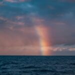 pink and blue sky over sea